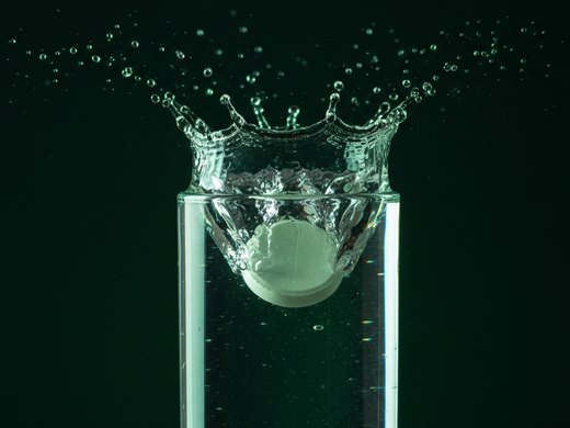 Drop a botaract tablet into a glass of water